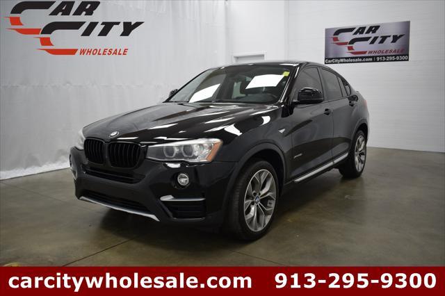 used 2016 BMW X4 car, priced at $17,635