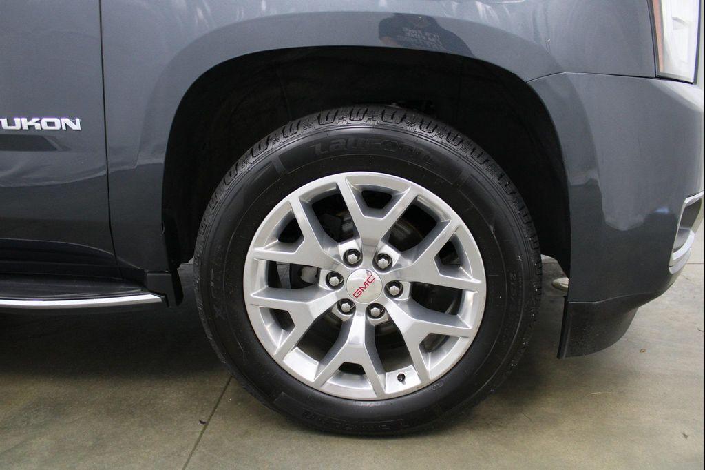 used 2019 GMC Yukon car, priced at $27,588