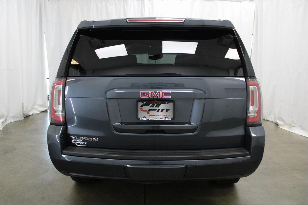 used 2019 GMC Yukon car, priced at $27,588