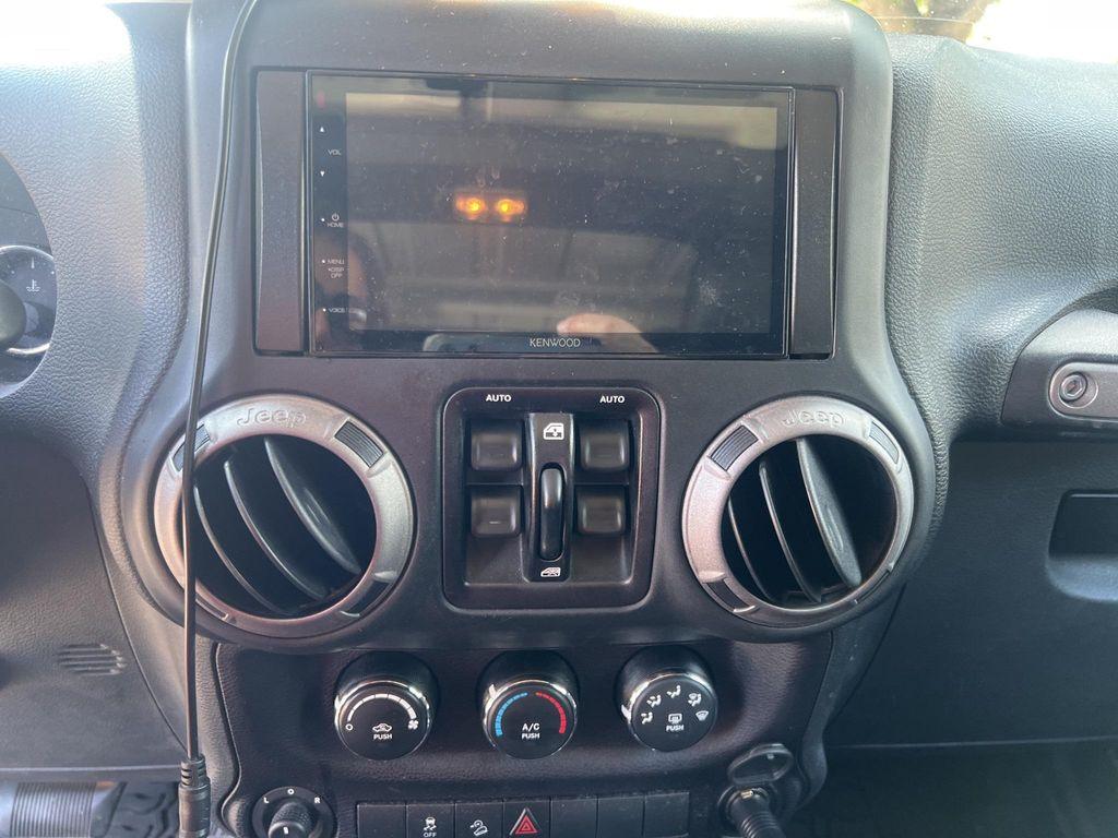 used 2016 Jeep Wrangler Unlimited car, priced at $17,689