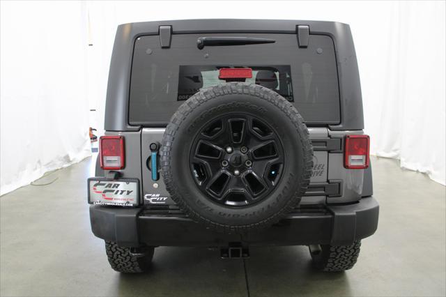 used 2016 Jeep Wrangler Unlimited car, priced at $18,031