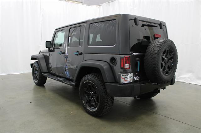 used 2016 Jeep Wrangler Unlimited car, priced at $18,031