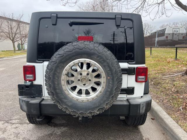 used 2016 Jeep Wrangler Unlimited car, priced at $18,791