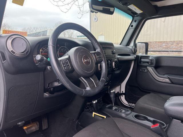 used 2016 Jeep Wrangler Unlimited car, priced at $18,791