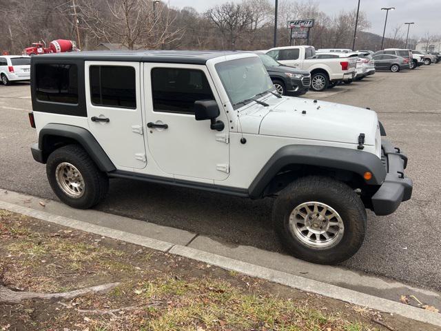 used 2016 Jeep Wrangler Unlimited car, priced at $18,791