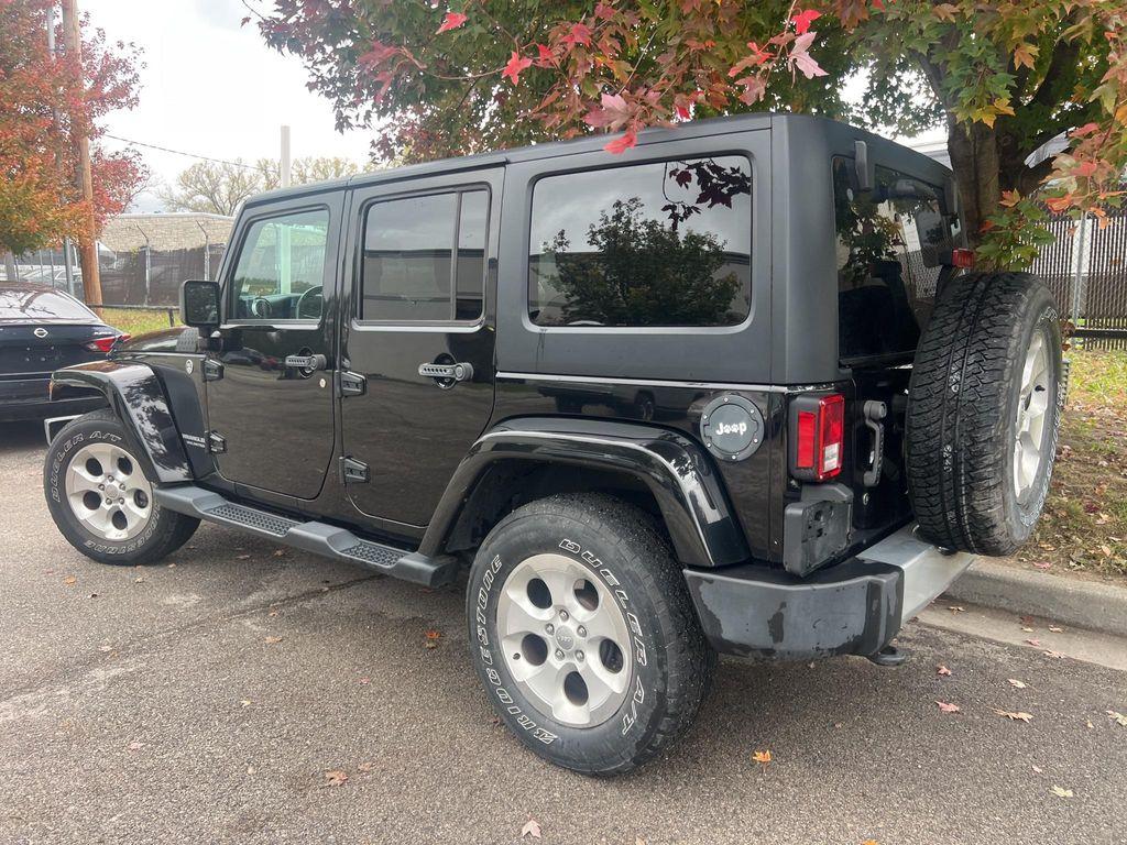 used 2015 Jeep Wrangler Unlimited car, priced at $17,375
