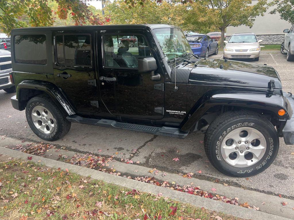 used 2015 Jeep Wrangler Unlimited car, priced at $17,375