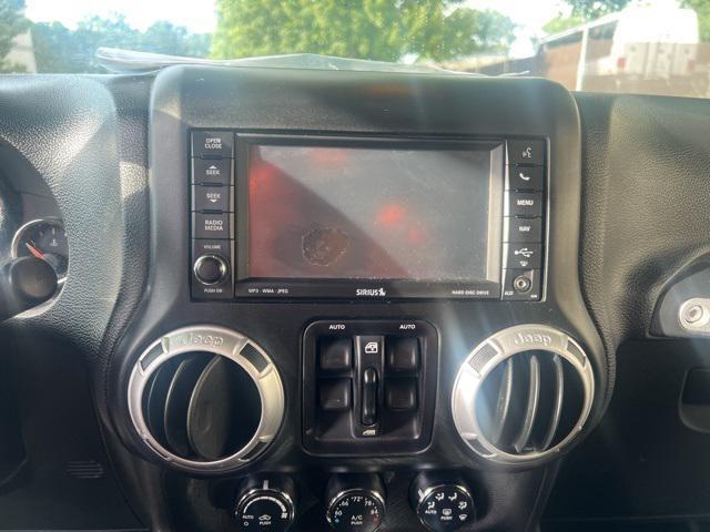 used 2015 Jeep Wrangler Unlimited car, priced at $20,400