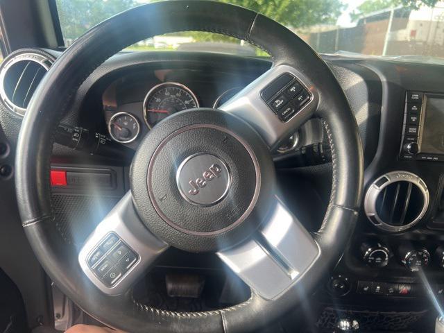 used 2015 Jeep Wrangler Unlimited car, priced at $20,400