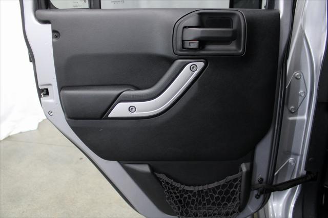 used 2015 Jeep Wrangler Unlimited car, priced at $18,977