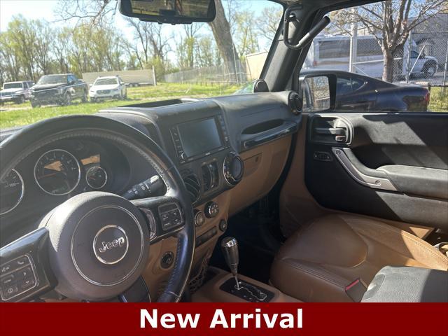 used 2014 Jeep Wrangler Unlimited car, priced at $15,227