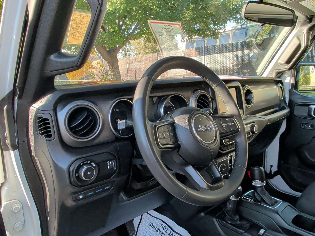 used 2023 Jeep Wrangler 4xe car, priced at $27,610