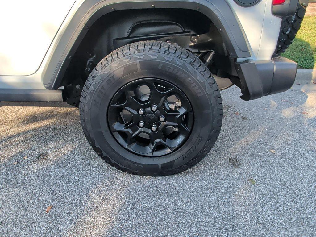 used 2023 Jeep Wrangler 4xe car, priced at $27,610