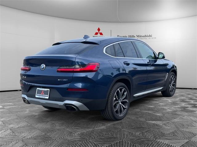 used 2022 BMW X4 car, priced at $36,877