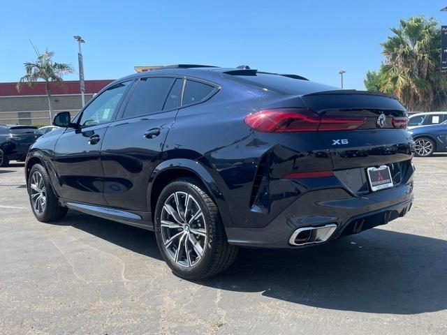 used 2024 BMW X6 car, priced at $57,417