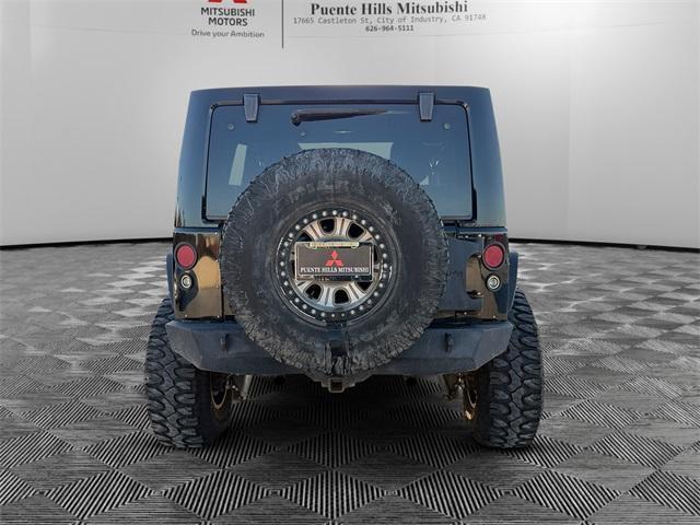used 2015 Jeep Wrangler Unlimited car, priced at $19,999