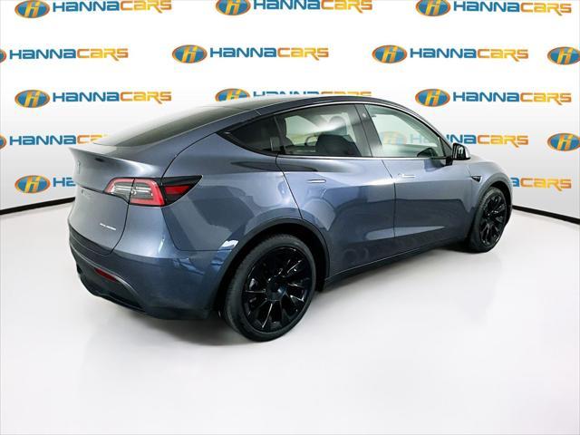 used 2023 Tesla Model Y car, priced at $32,999