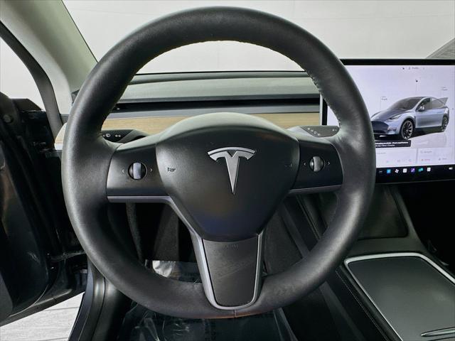 used 2023 Tesla Model Y car, priced at $32,999