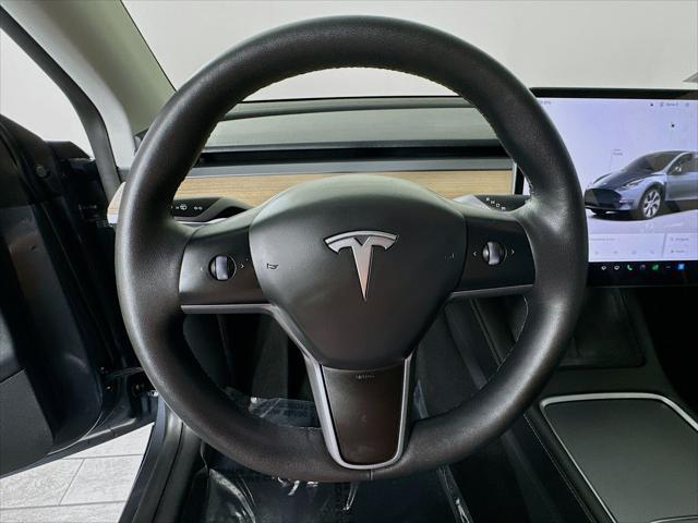 used 2023 Tesla Model Y car, priced at $35,499