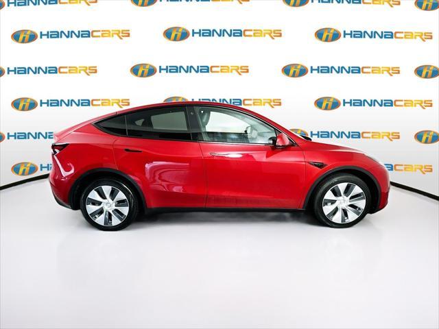 used 2023 Tesla Model Y car, priced at $34,299