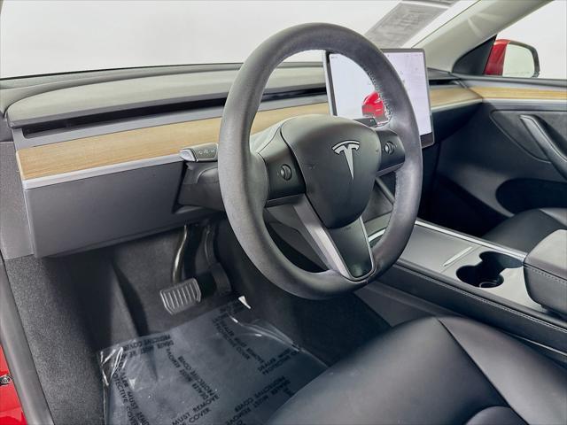 used 2023 Tesla Model Y car, priced at $34,299