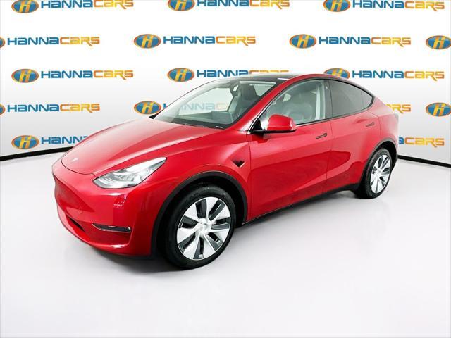 used 2023 Tesla Model Y car, priced at $34,299