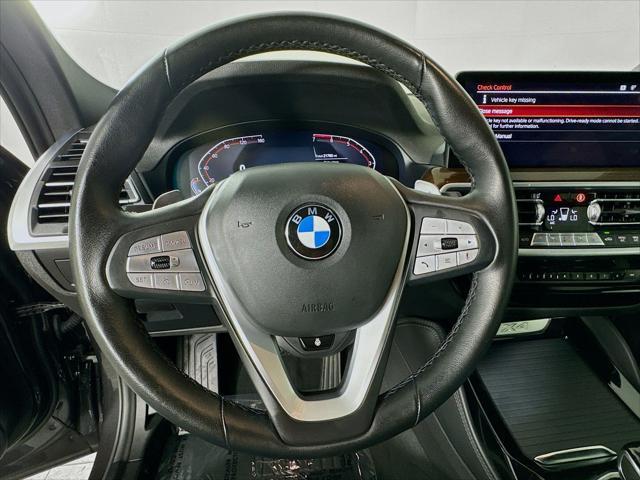 used 2023 BMW X4 car, priced at $39,999