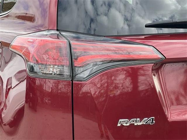 used 2018 Toyota RAV4 car, priced at $19,257