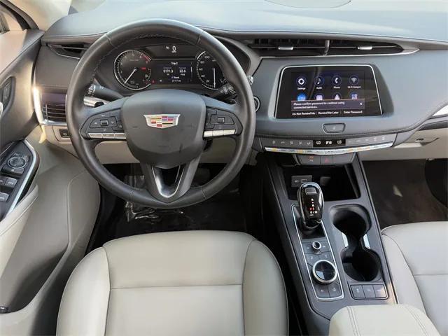 used 2023 Cadillac XT4 car, priced at $29,459
