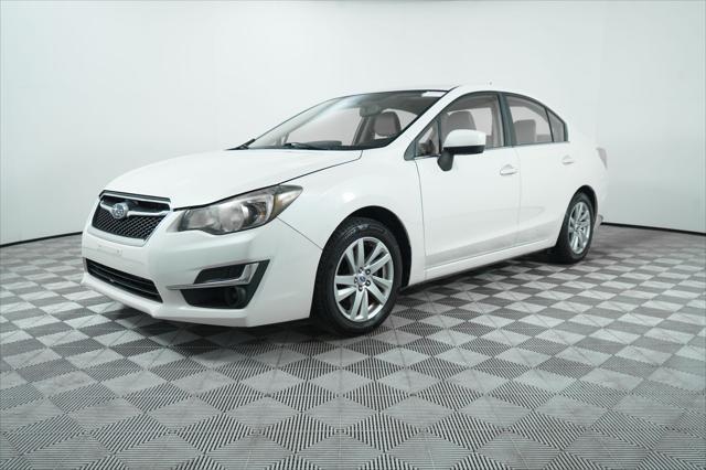 used 2016 Subaru Impreza car, priced at $14,000