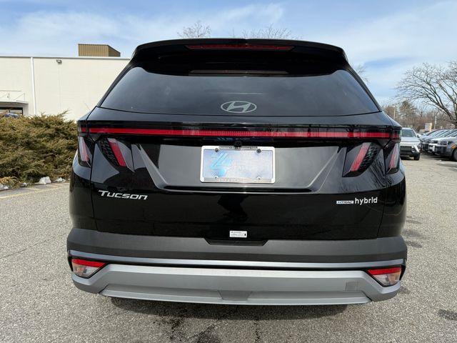 new 2025 Hyundai TUCSON Hybrid car, priced at $39,095