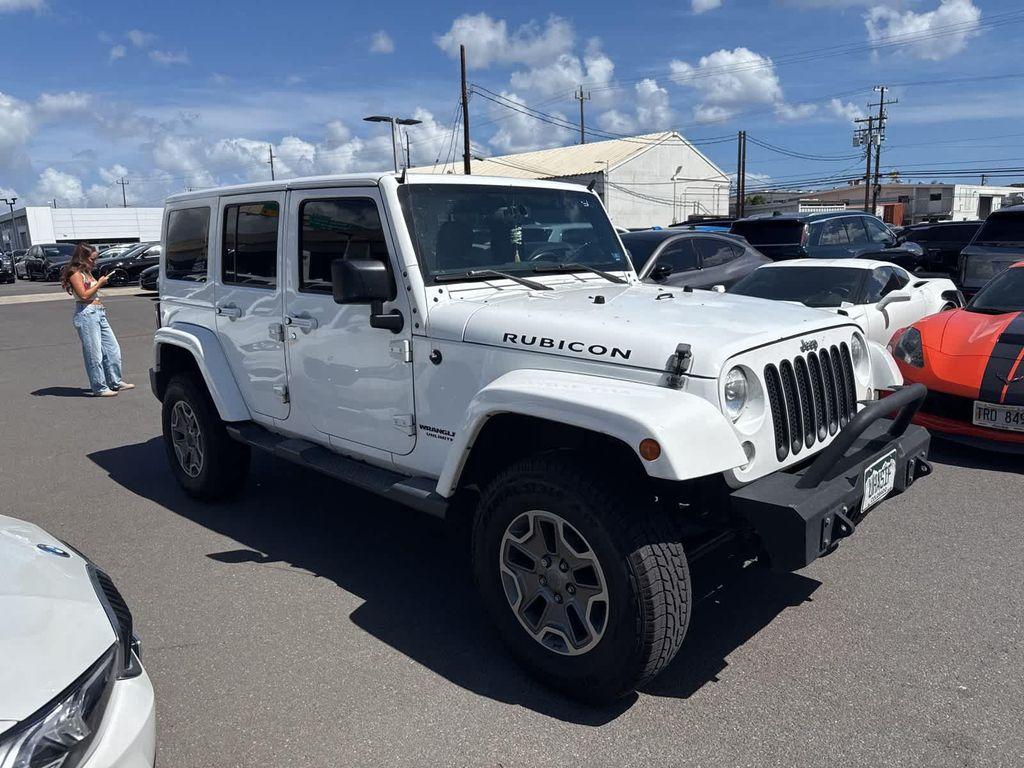 used 2015 Jeep Wrangler Unlimited car, priced at $19,729