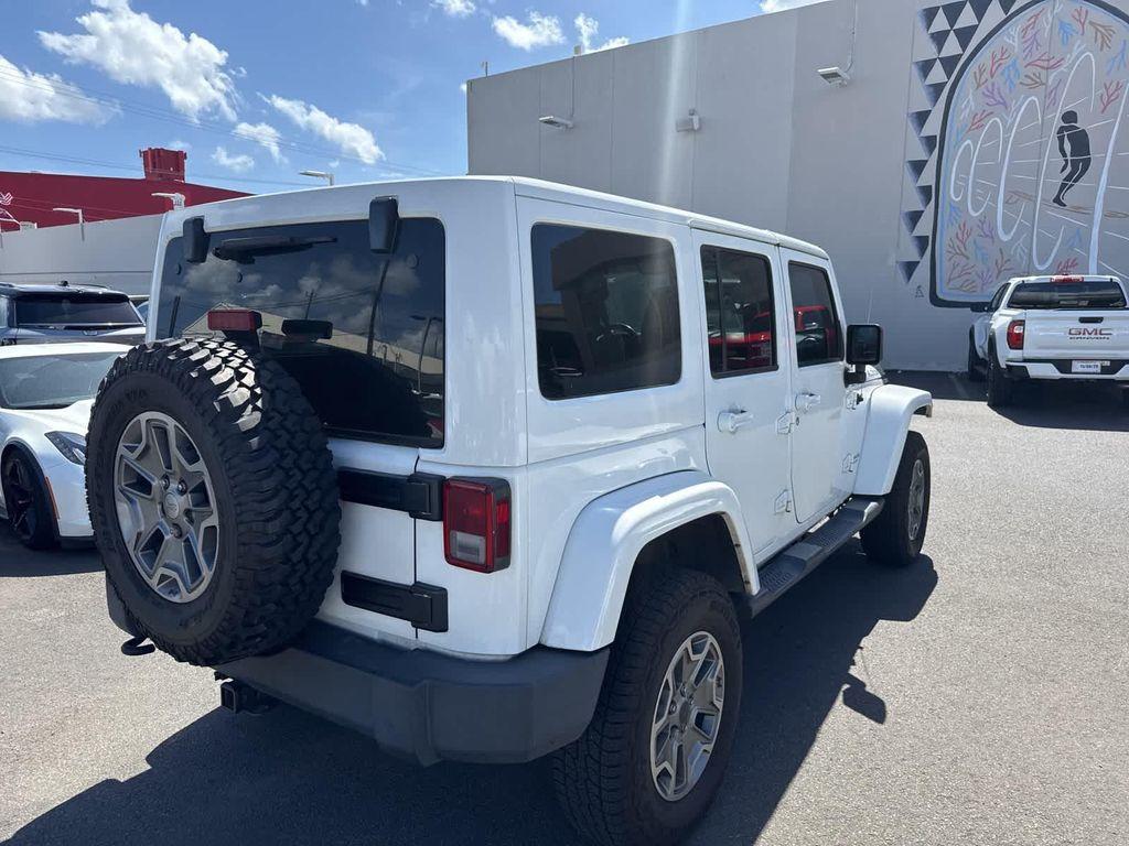 used 2015 Jeep Wrangler Unlimited car, priced at $19,729
