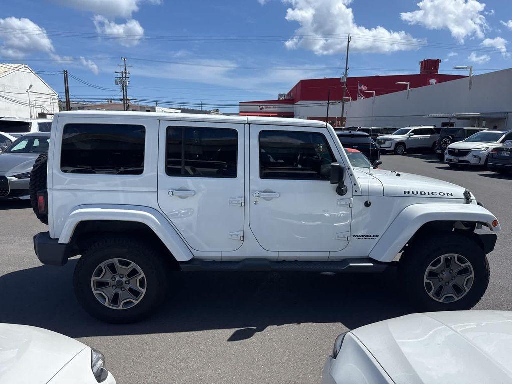 used 2015 Jeep Wrangler Unlimited car, priced at $19,729