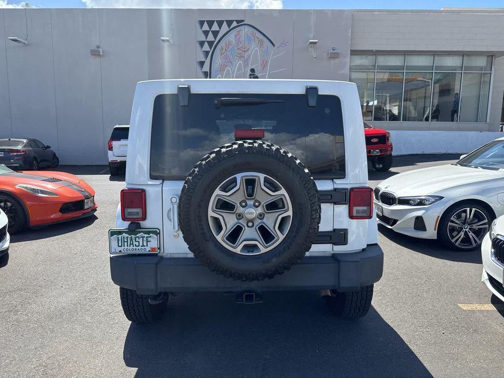 used 2015 Jeep Wrangler Unlimited car, priced at $19,729