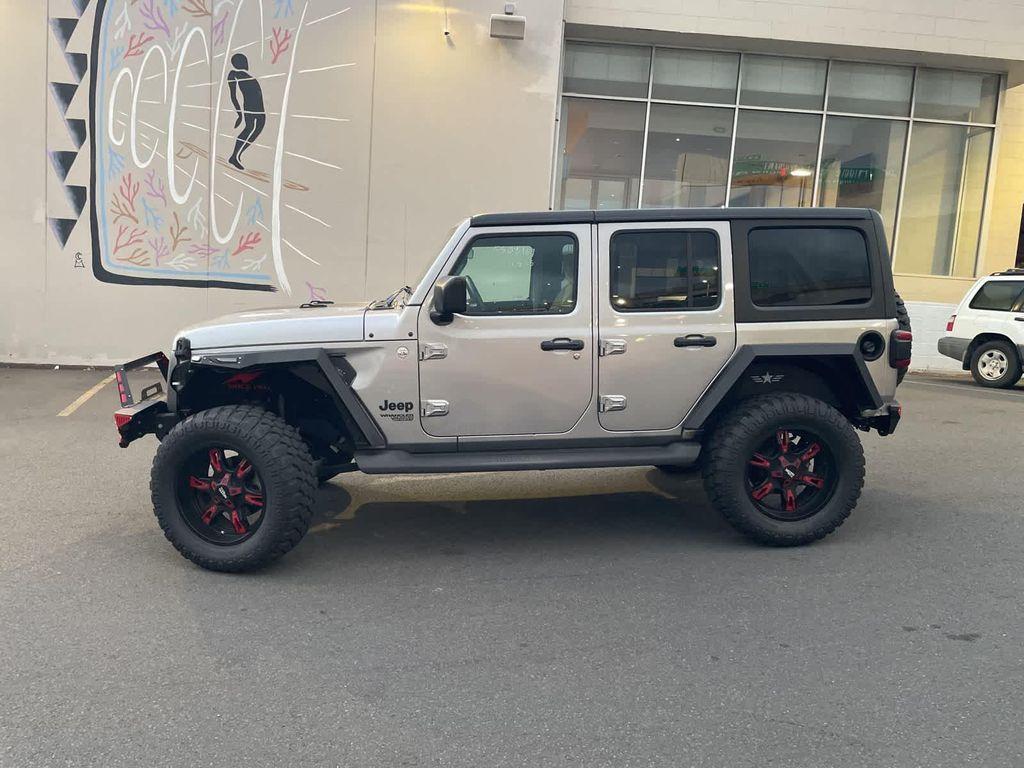 used 2021 Jeep Wrangler Unlimited car, priced at $32,524