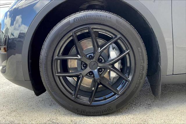 used 2025 Tesla Model Y car, priced at $41,314