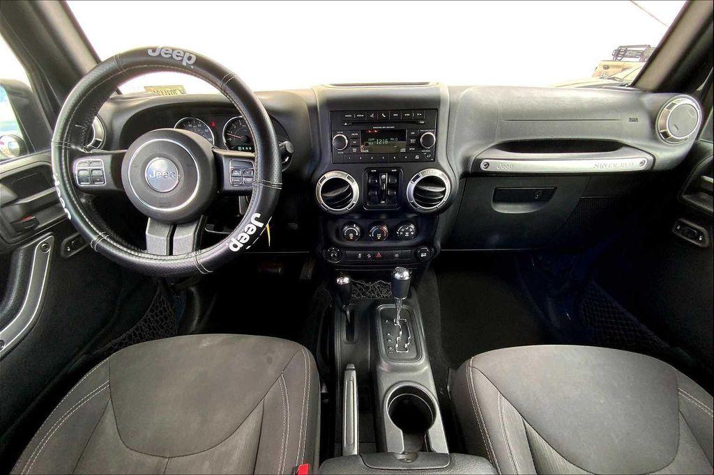 used 2017 Jeep Wrangler Unlimited car, priced at $25,009