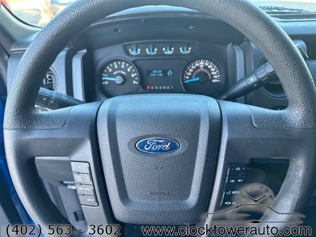 used 2014 Ford F-150 car, priced at $15,000