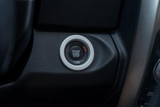 used 2018 Ram 1500 car, priced at $29,591