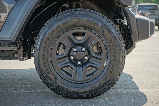 used 2024 Jeep Wrangler car, priced at $31,500