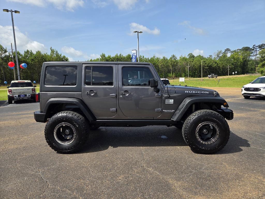 used 2016 Jeep Wrangler Unlimited car, priced at $23,900