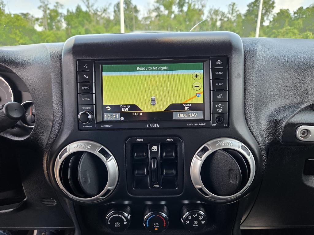 used 2016 Jeep Wrangler Unlimited car, priced at $23,900