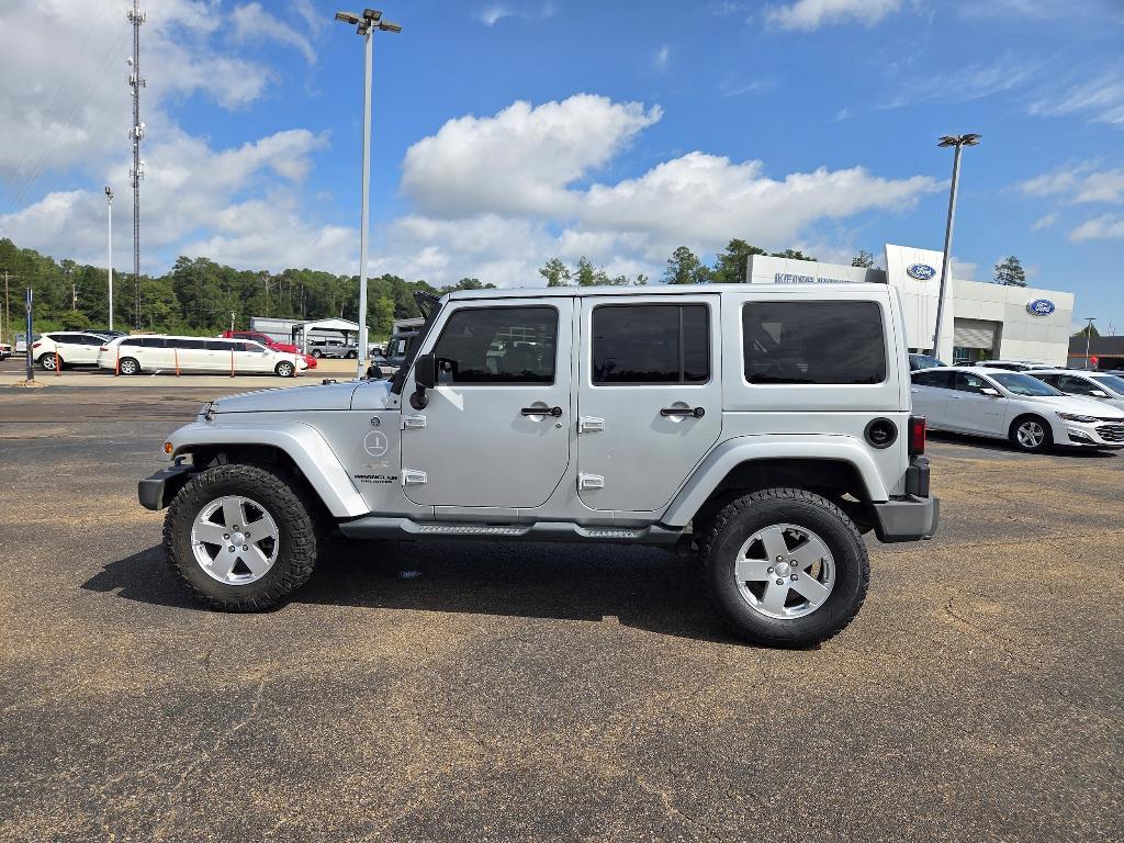 used 2012 Jeep Wrangler Unlimited car, priced at $15,899