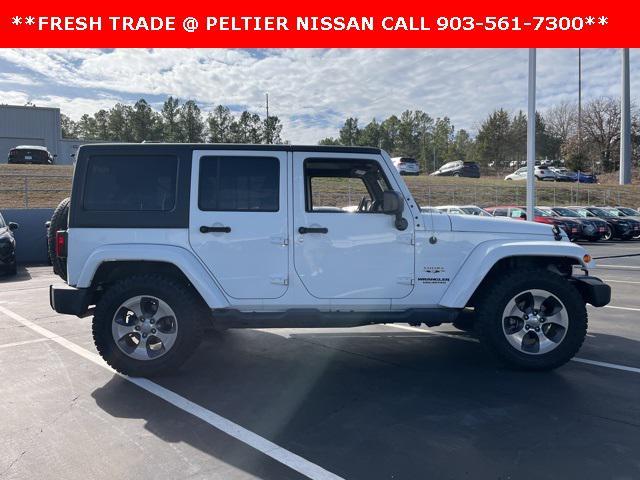 used 2016 Jeep Wrangler Unlimited car, priced at $23,831