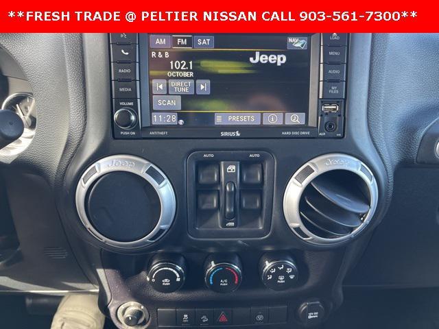 used 2016 Jeep Wrangler Unlimited car, priced at $23,831