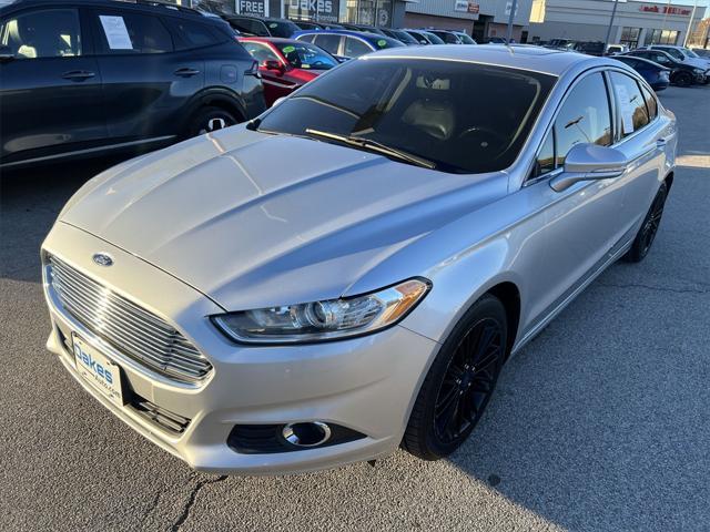 used 2016 Ford Fusion car, priced at $12,000