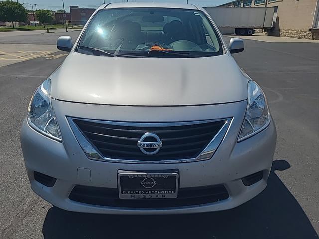 used 2014 Nissan Versa car, priced at $7,000