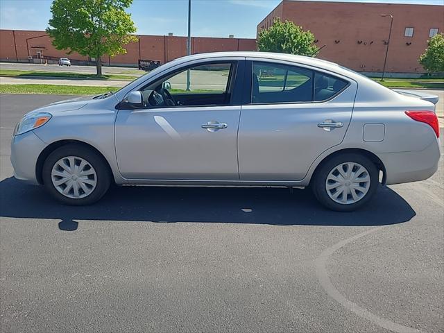 used 2014 Nissan Versa car, priced at $7,000