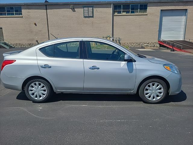 used 2014 Nissan Versa car, priced at $7,000